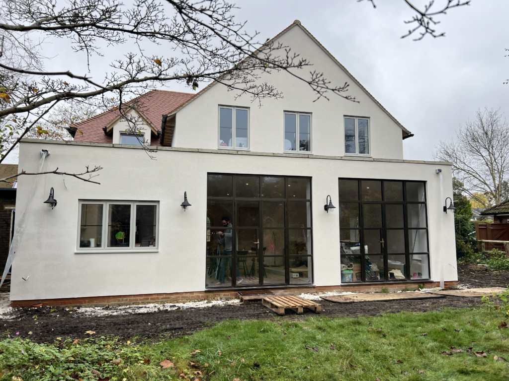 A beautifully rendered home in Guildford displaying a clean, modern, and weather-resistant exterior finish