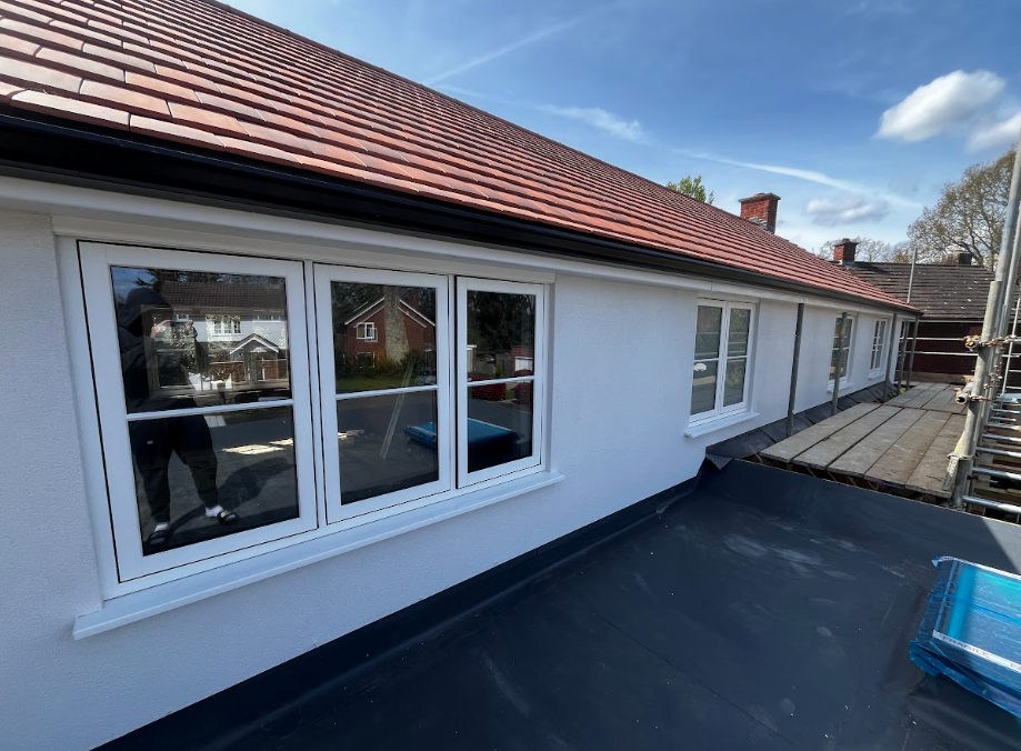 A fully restored, premium detached house in the UK with a smooth white silicone render finish boosting its curb appeal